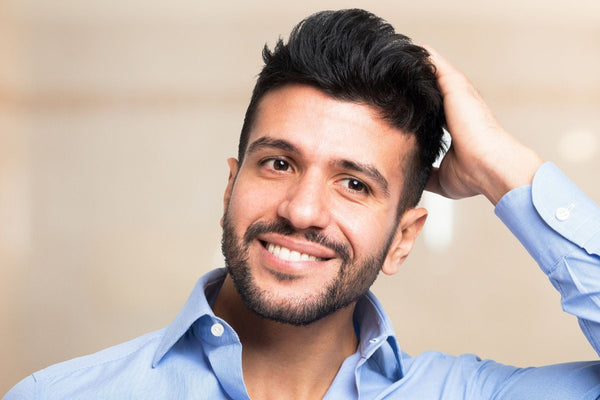 man with great hair after hair transplant