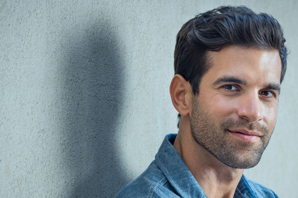 handsome man after applying urth men's anti wrinkle cream