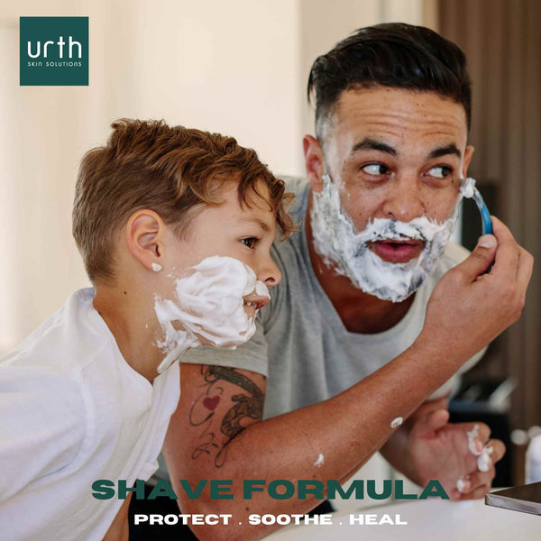 man and young son shaving with urth shave formula