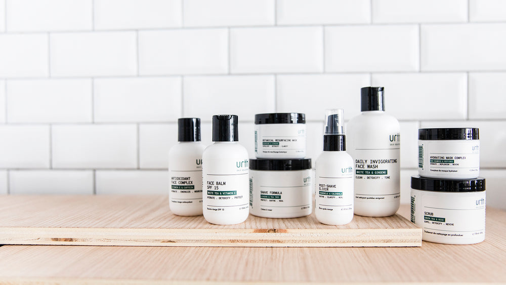 Group picture of all urth skin solution's clean skincare for men products with a white subway tile background 